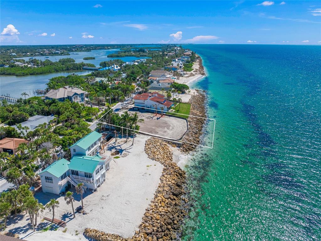 141 North Casey Key Road Osprey, FL 34229 - Photo 6 of 9 a view of a lake with outdoor space