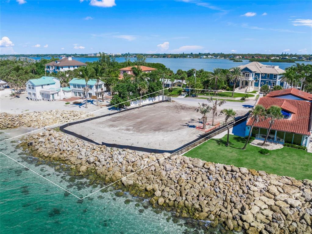 141 North Casey Key Road Nokomis, FL 34275 - Photo 6 of 45 an aerial view of a house with outdoor space and city view