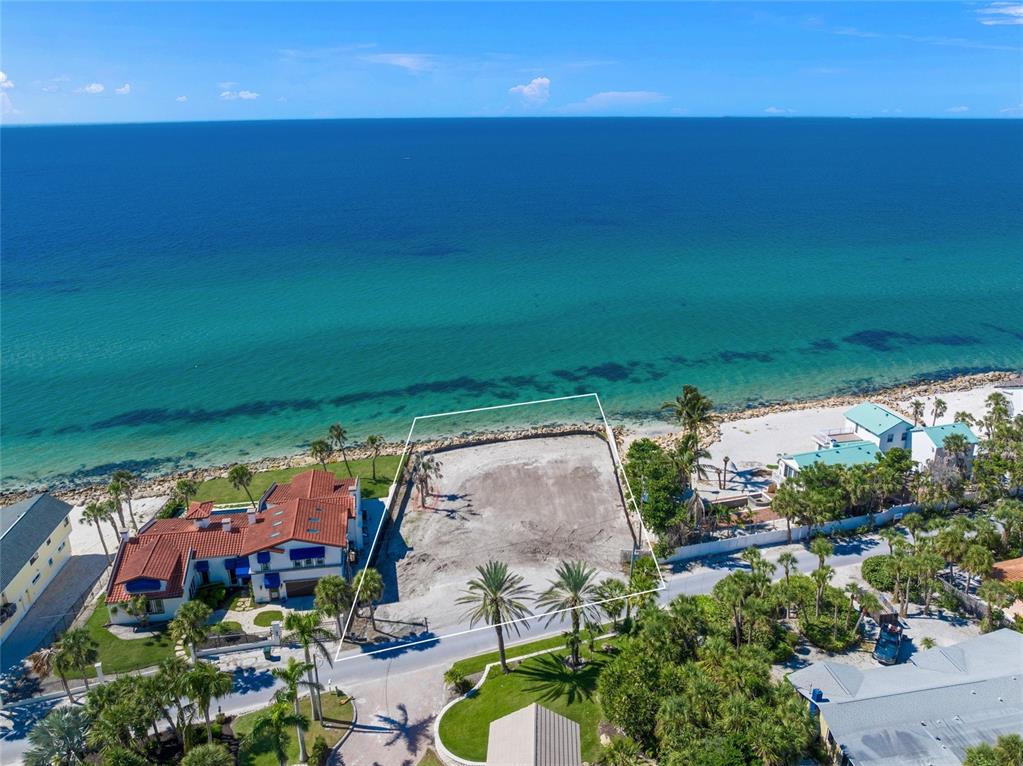 141 North Casey Key Road Nokomis, FL 34275 - Photo 7 of 45 an aerial view of a house with a garden