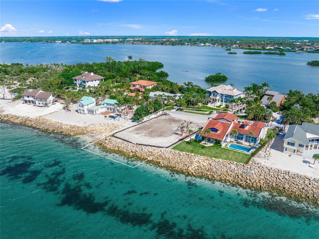 141 North Casey Key Road Osprey, FL 34229 - Photo 7 of 9 a view of a lake with a city view