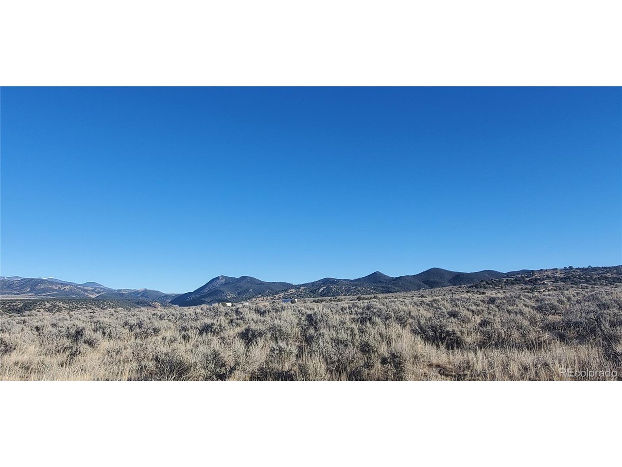 4125 Woodman Road Fort Garland, CO 81133 - Photo 3 of 14 a view of a sky from a terrace