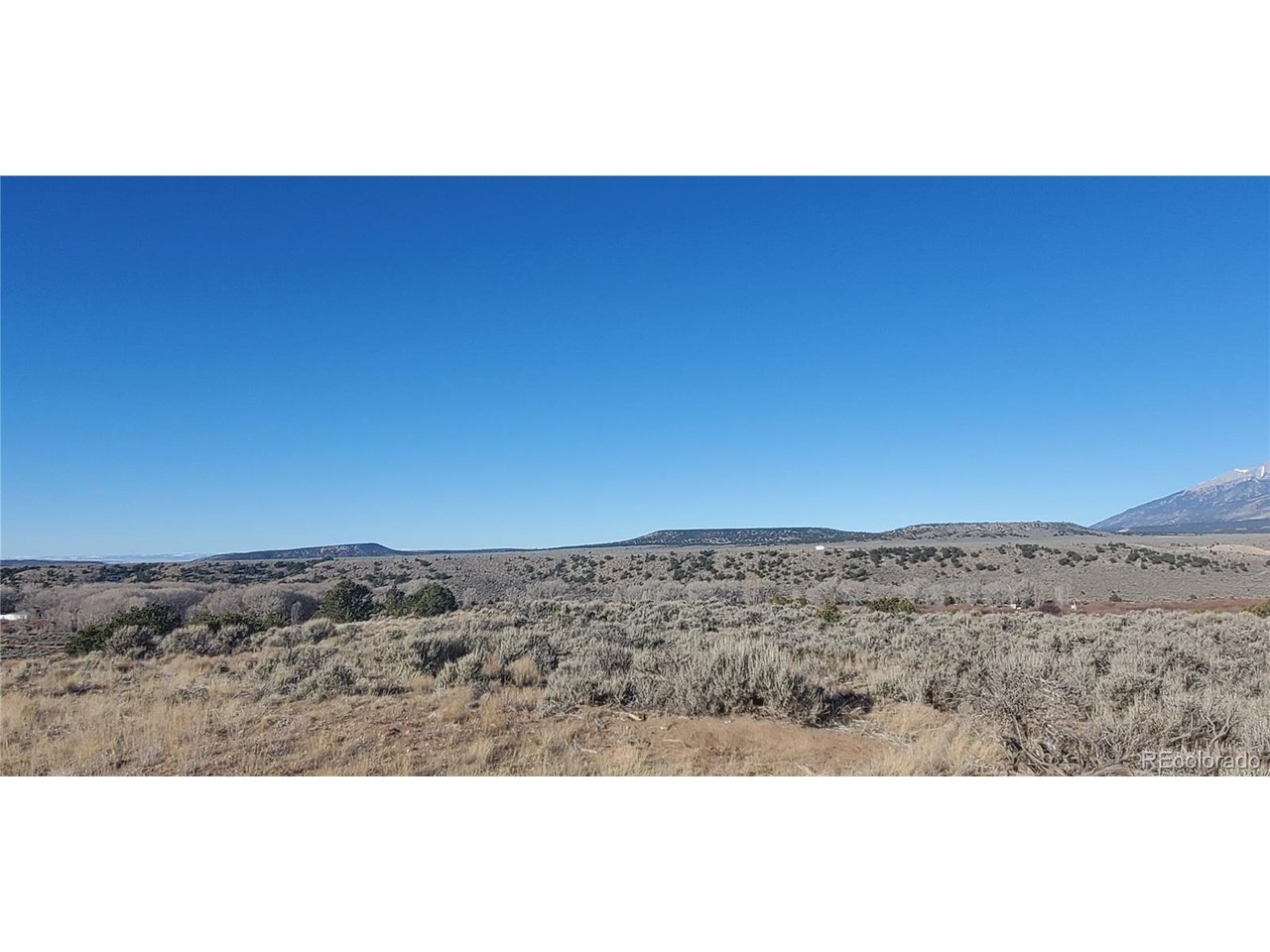 4125 Woodman Road Fort Garland, CO 81133 - Photo 10 of 14 a view of city and mountain