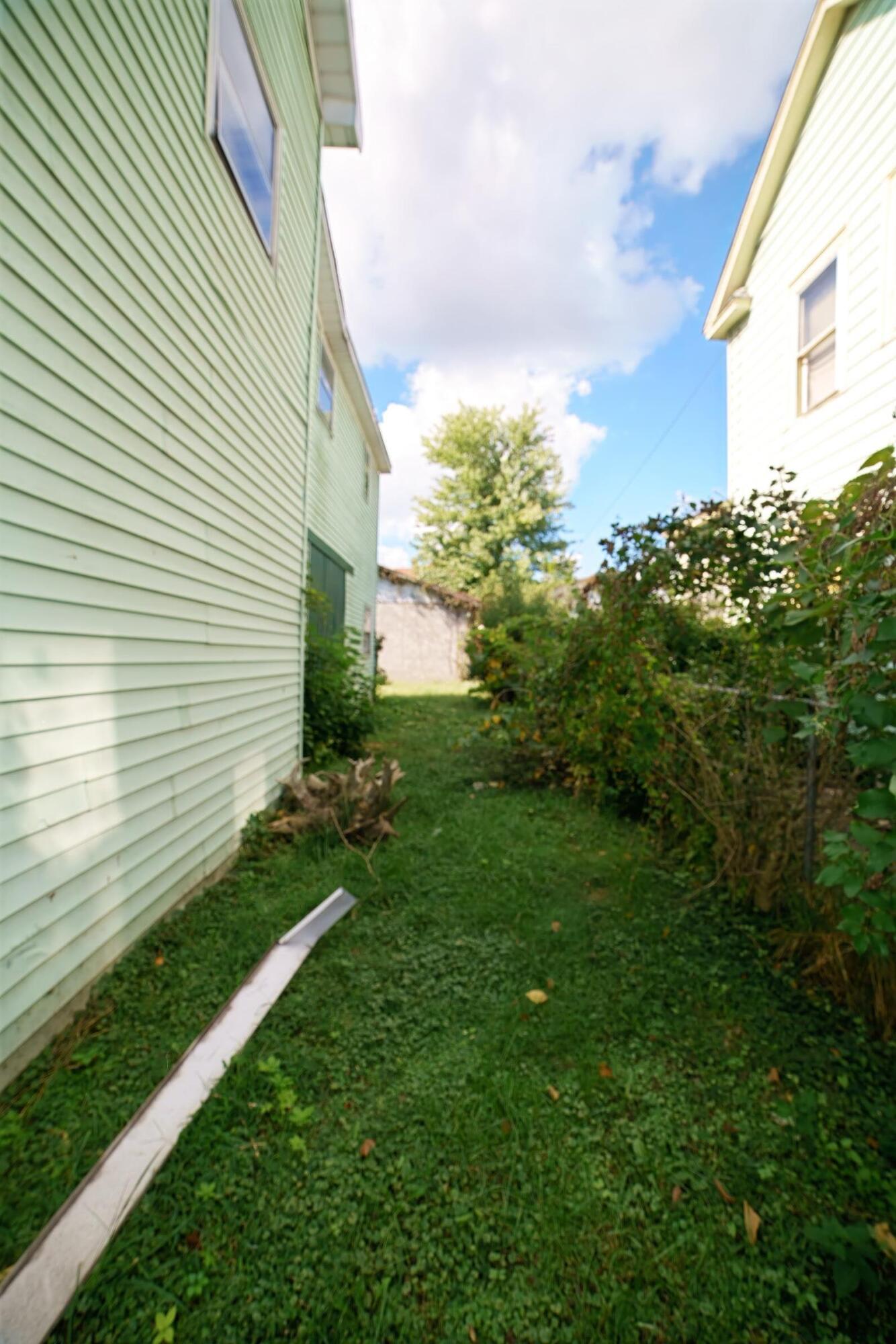 332 East Prospect Street Covington, VA 24426 - Photo 51 of 54 a view of a backyard with plants and a garden