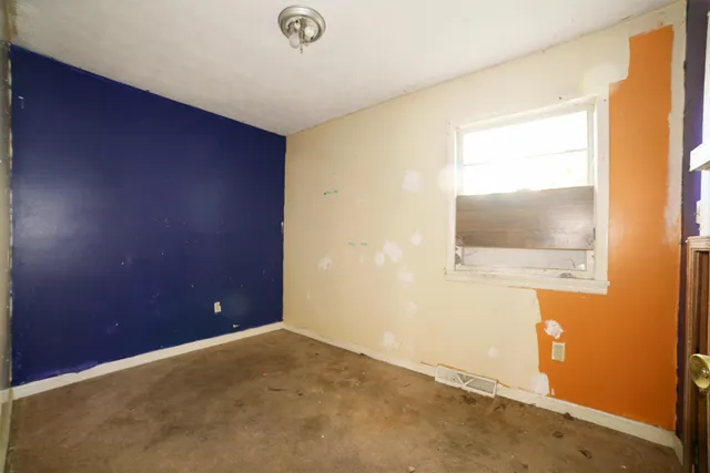 a view of a livingroom with a staircase