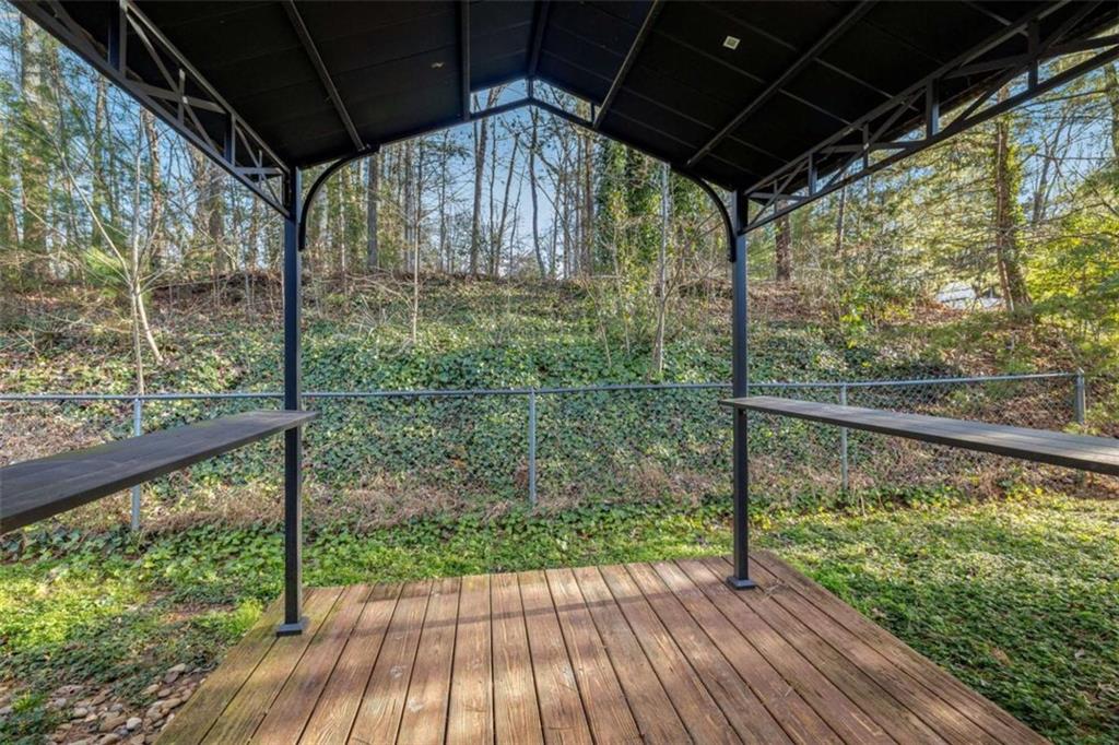 226 Chestnut Avenue Demorest, GA 30535 - Photo 14 of 47 a view of porch with wooden floor in outdoor space