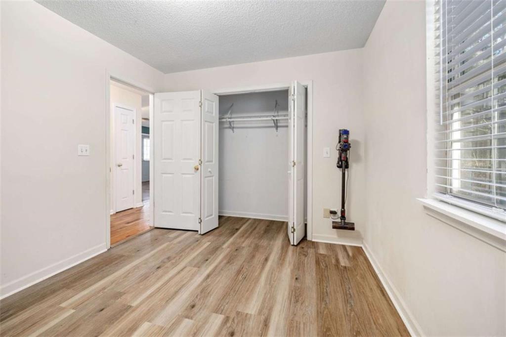 226 Chestnut Avenue Demorest, GA 30535 - Photo 24 of 47 a view of a room with wooden floor and a sink