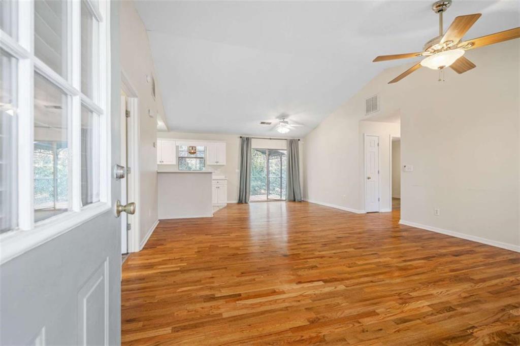 226 Chestnut Avenue Demorest, GA 30535 - Photo 5 of 47 a view of an empty room with window and cabinet