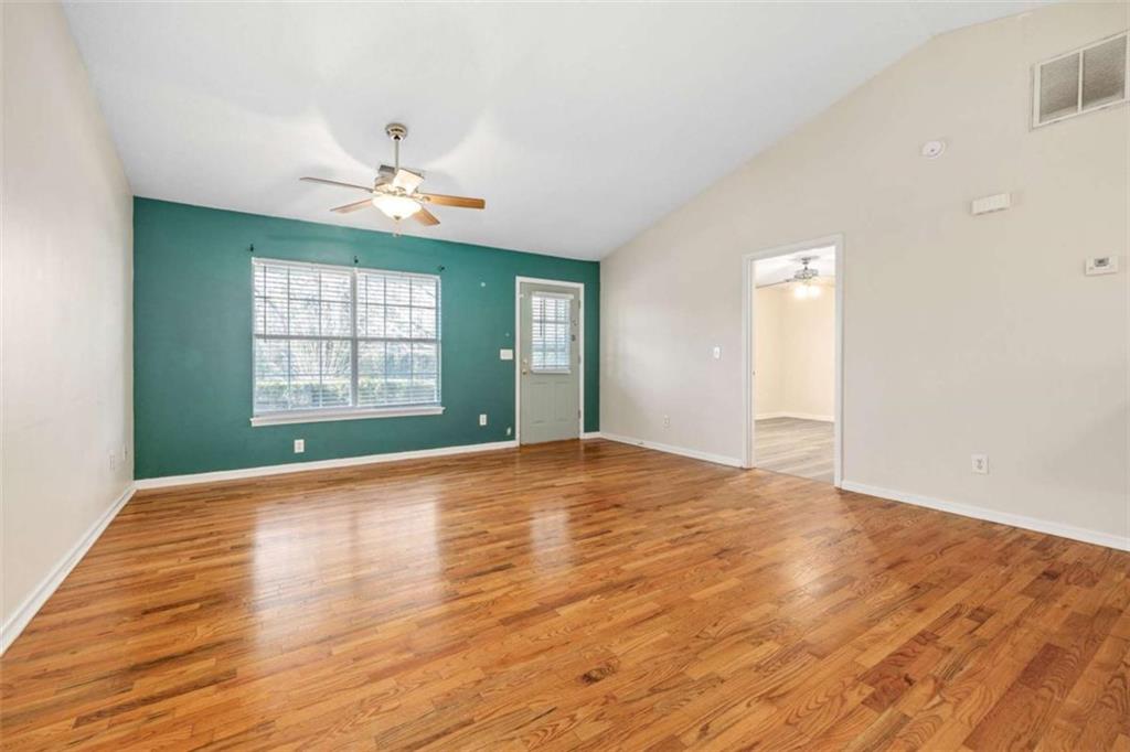 226 Chestnut Avenue Demorest, GA 30535 - Photo 8 of 47 wooden floor in an empty room with a window