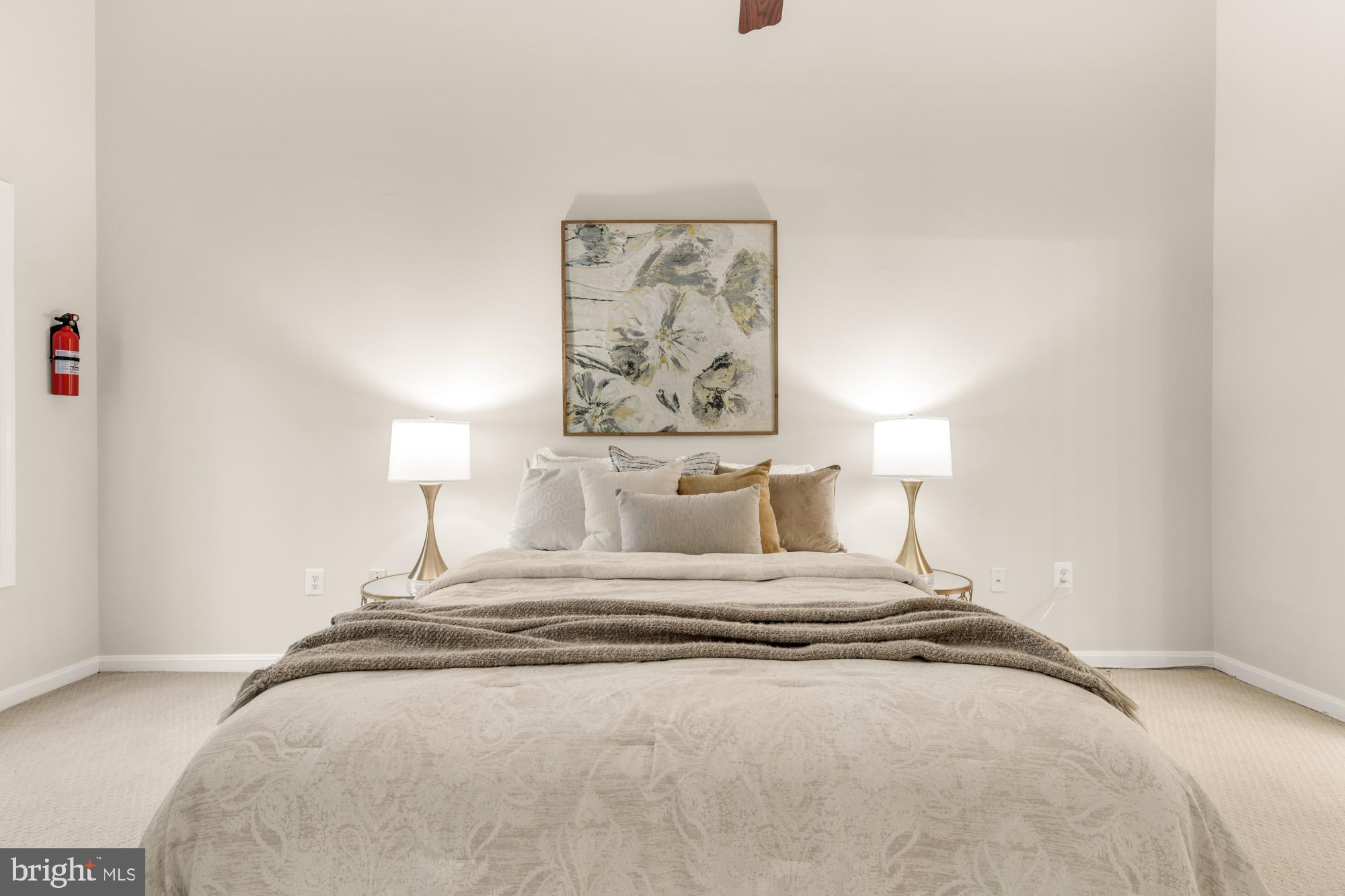 45 Windbrooke Circle, Unit 45 Gaithersburg, MD 20879 - Photo 24 of 29 a bedroom with a bed and a lamp