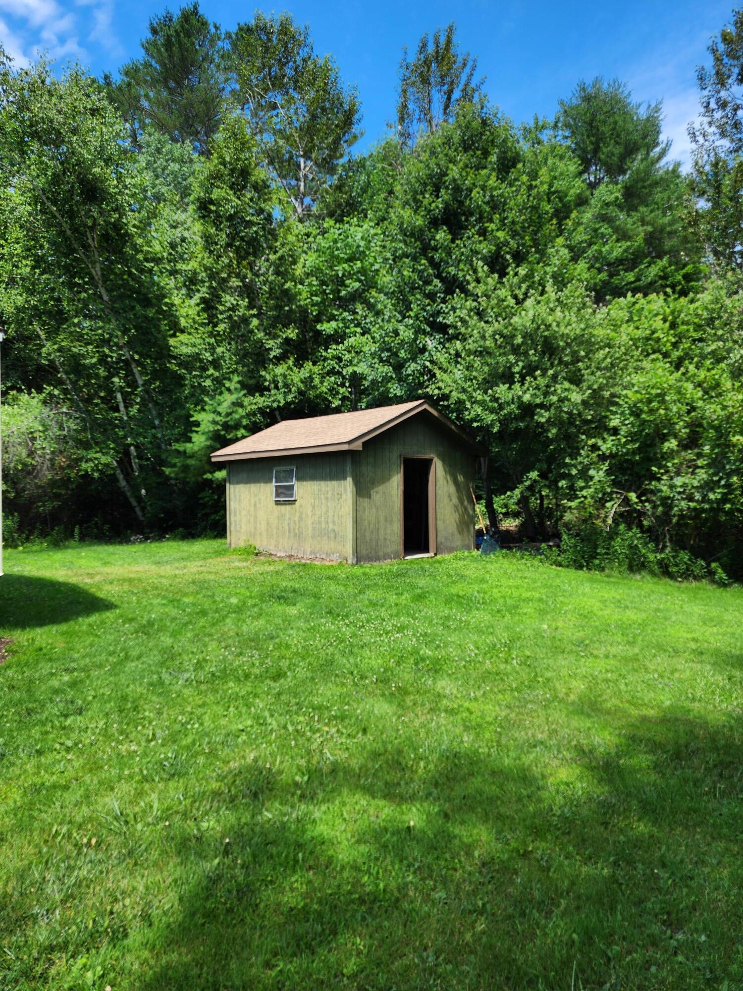 309 Stetson Road West Levant, ME 04456 - Photo 3 of 22 Back lawn