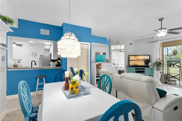 a bedroom with a bed and a desk