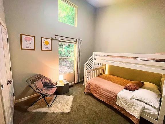 837 Forrest Circle Southeast Atlanta, GA 30354 - Photo 12 of 17 a bedroom with a bed chair and window