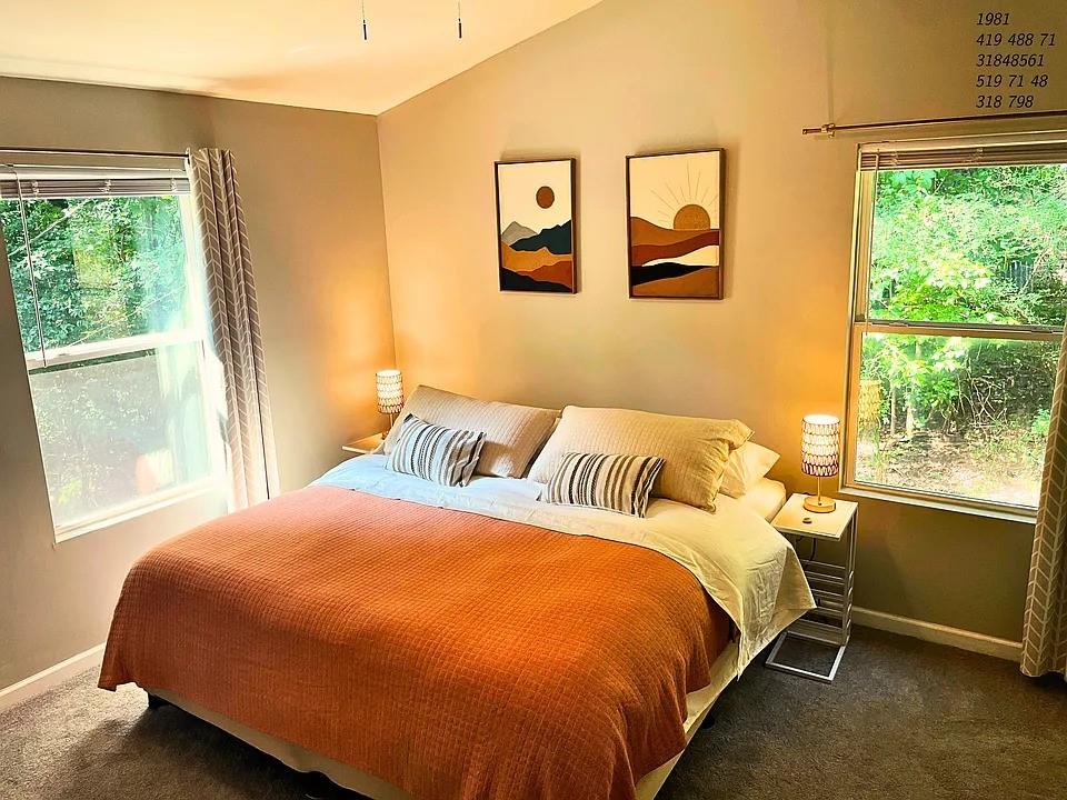 837 Forrest Circle Southeast Atlanta, GA 30354 - Photo 8 of 17 a bedroom with a bed and window