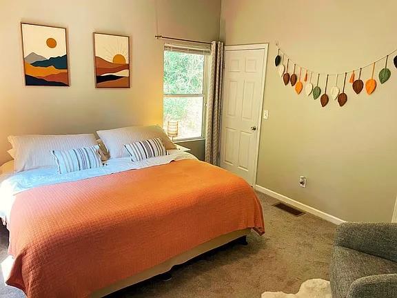 837 Forrest Circle Southeast Atlanta, GA 30354 - Photo 9 of 17 a bedroom with a bed and window