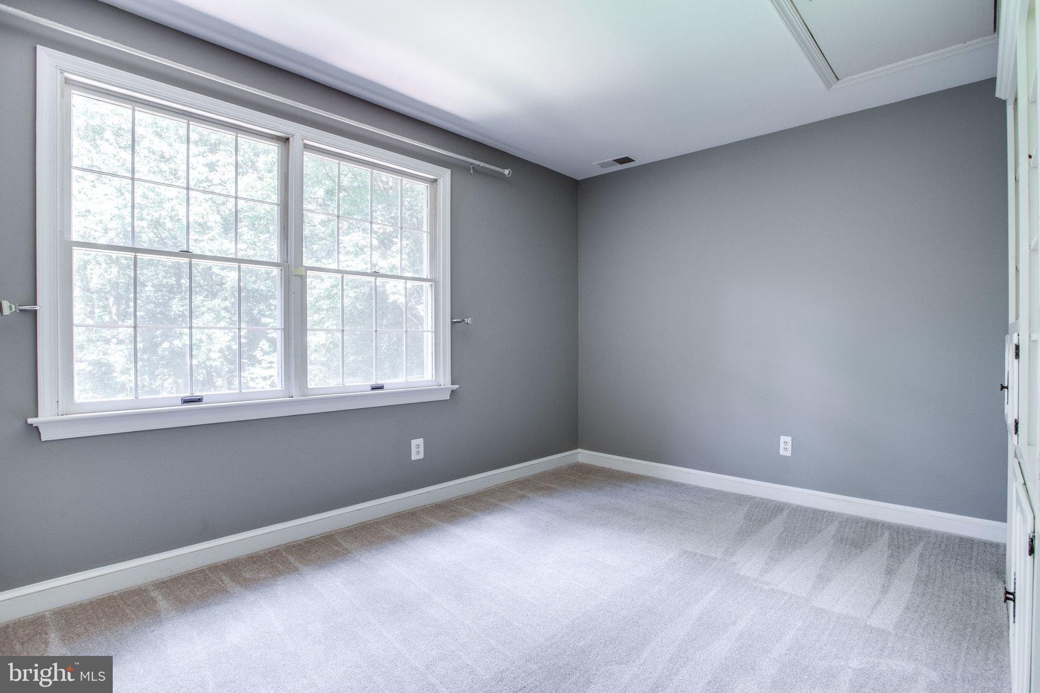 8500 Brook Road McLean, VA 22102 - Photo 41 of 59 a view of an empty room with a window
