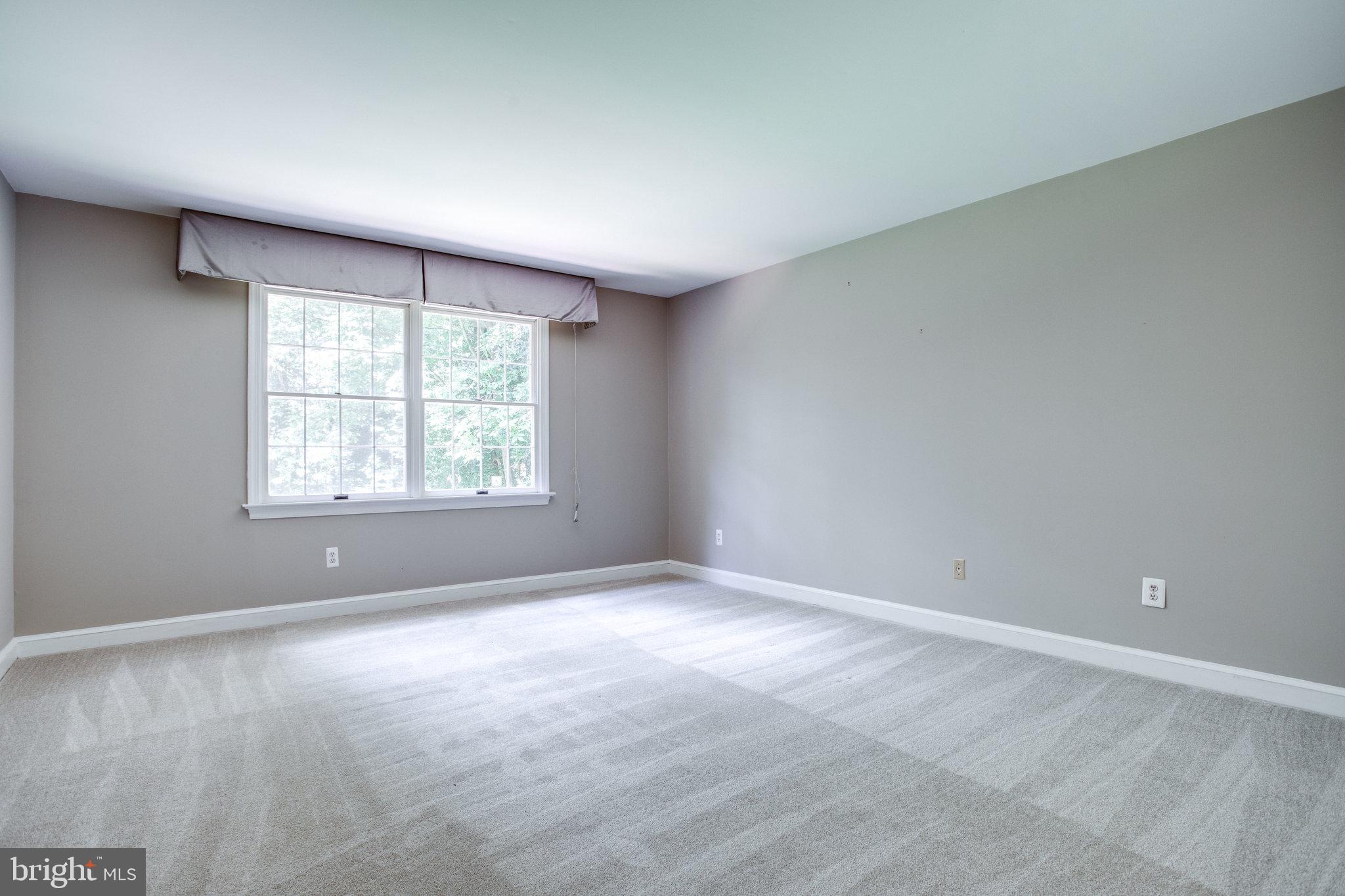 8500 Brook Road McLean, VA 22102 - Photo 43 of 59 an empty room with windows