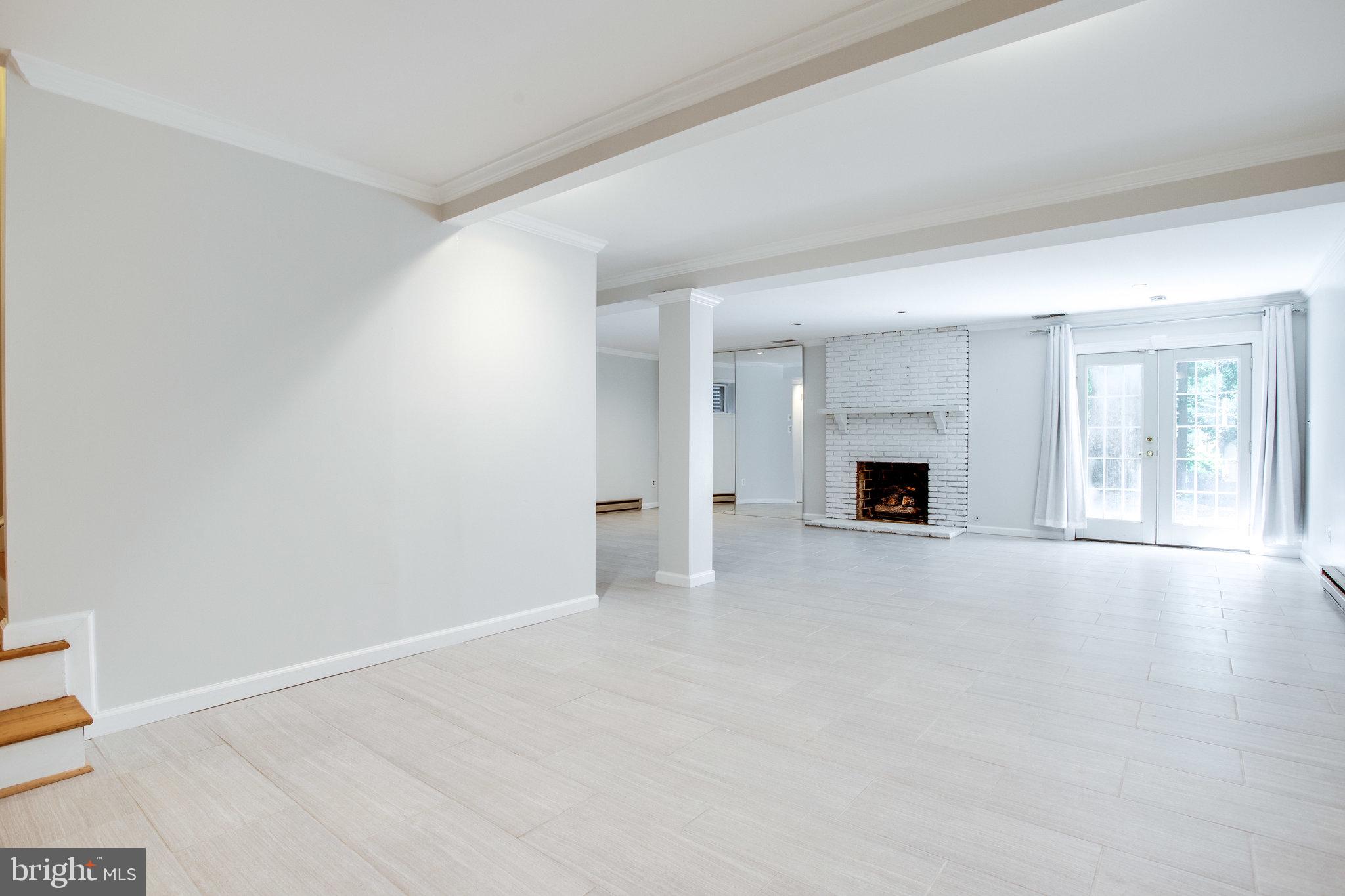 8500 Brook Road McLean, VA 22102 - Photo 46 of 59 a view of empty room with a fireplace
