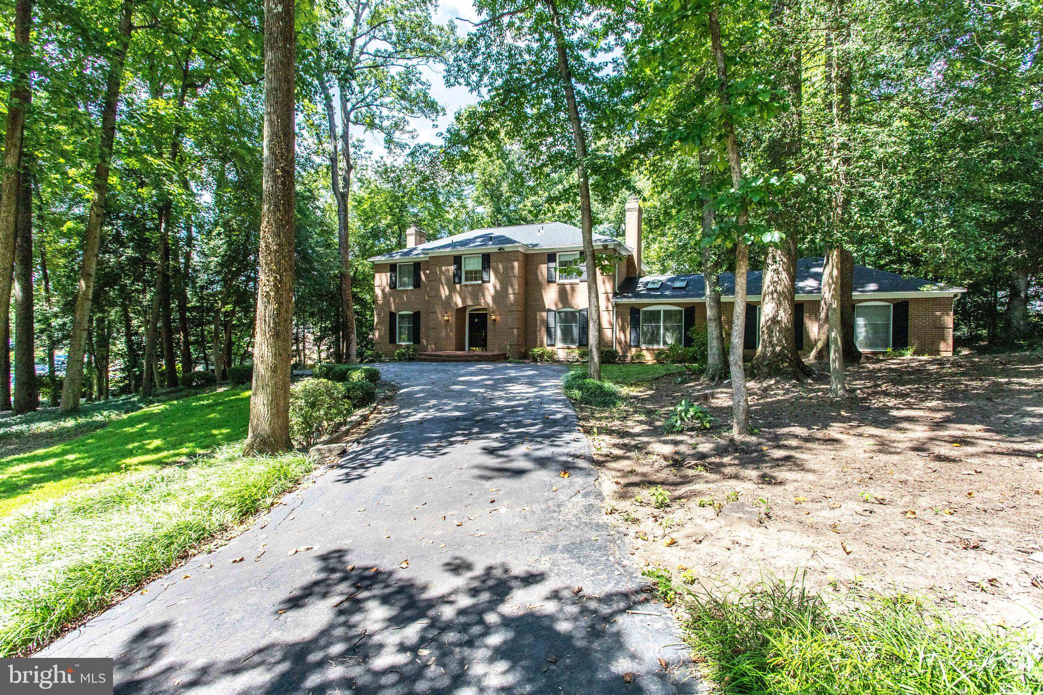 8500 Brook Road McLean, VA 22102 - Photo 54 of 59 a view of a house with a yard