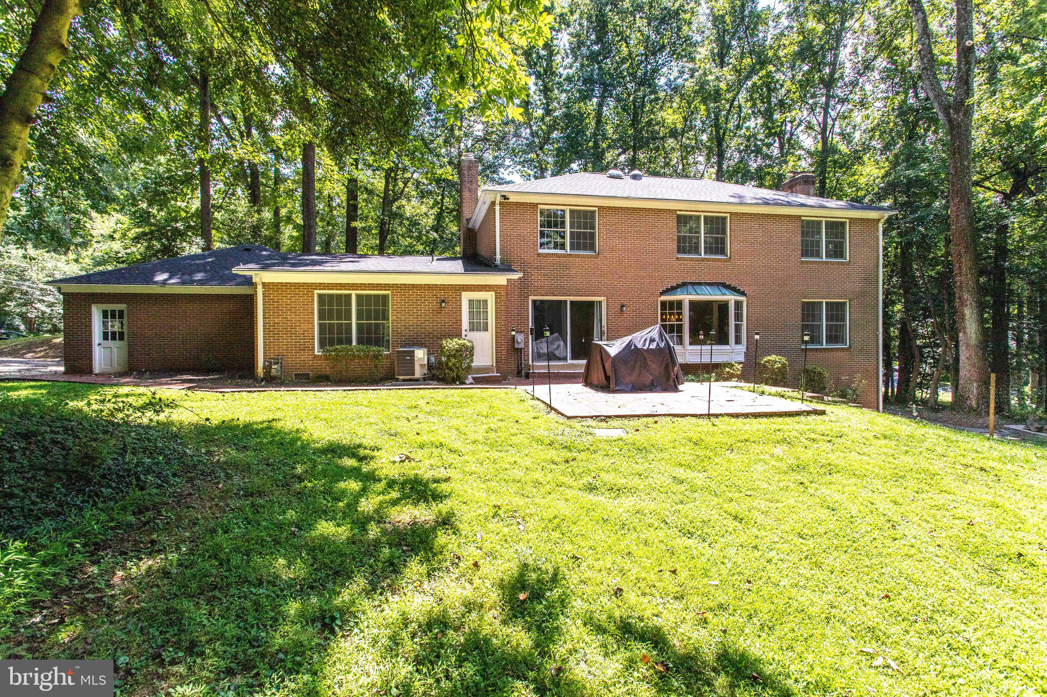 8500 Brook Road McLean, VA 22102 - Photo 59 of 59 a view of a house with a backyard