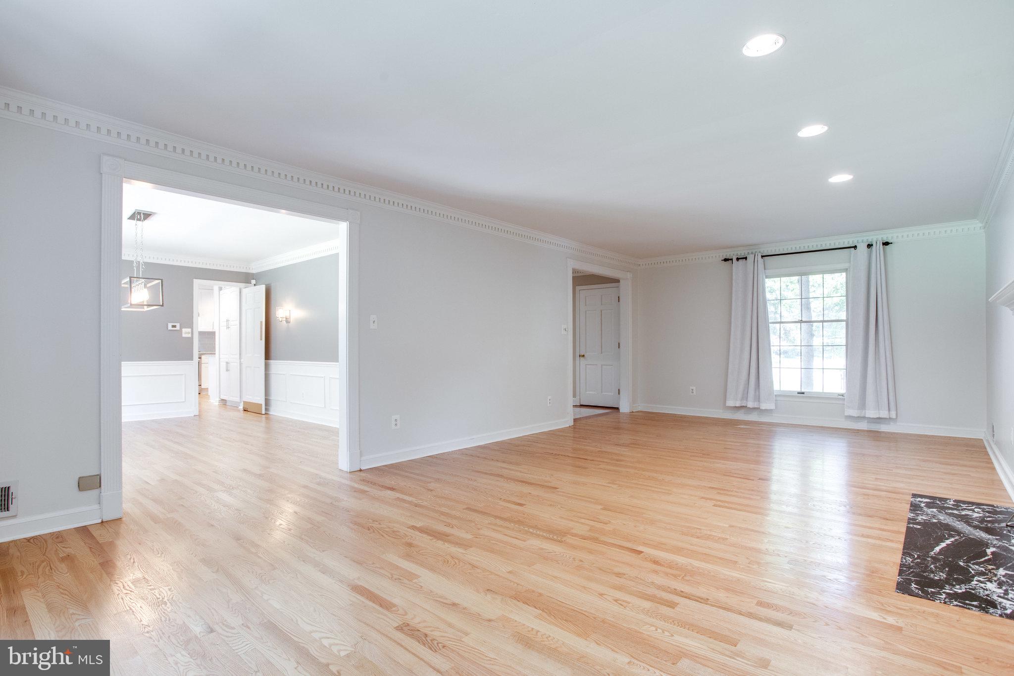 8500 Brook Road McLean, VA 22102 - Photo 7 of 59 a view of empty room with wooden floor
