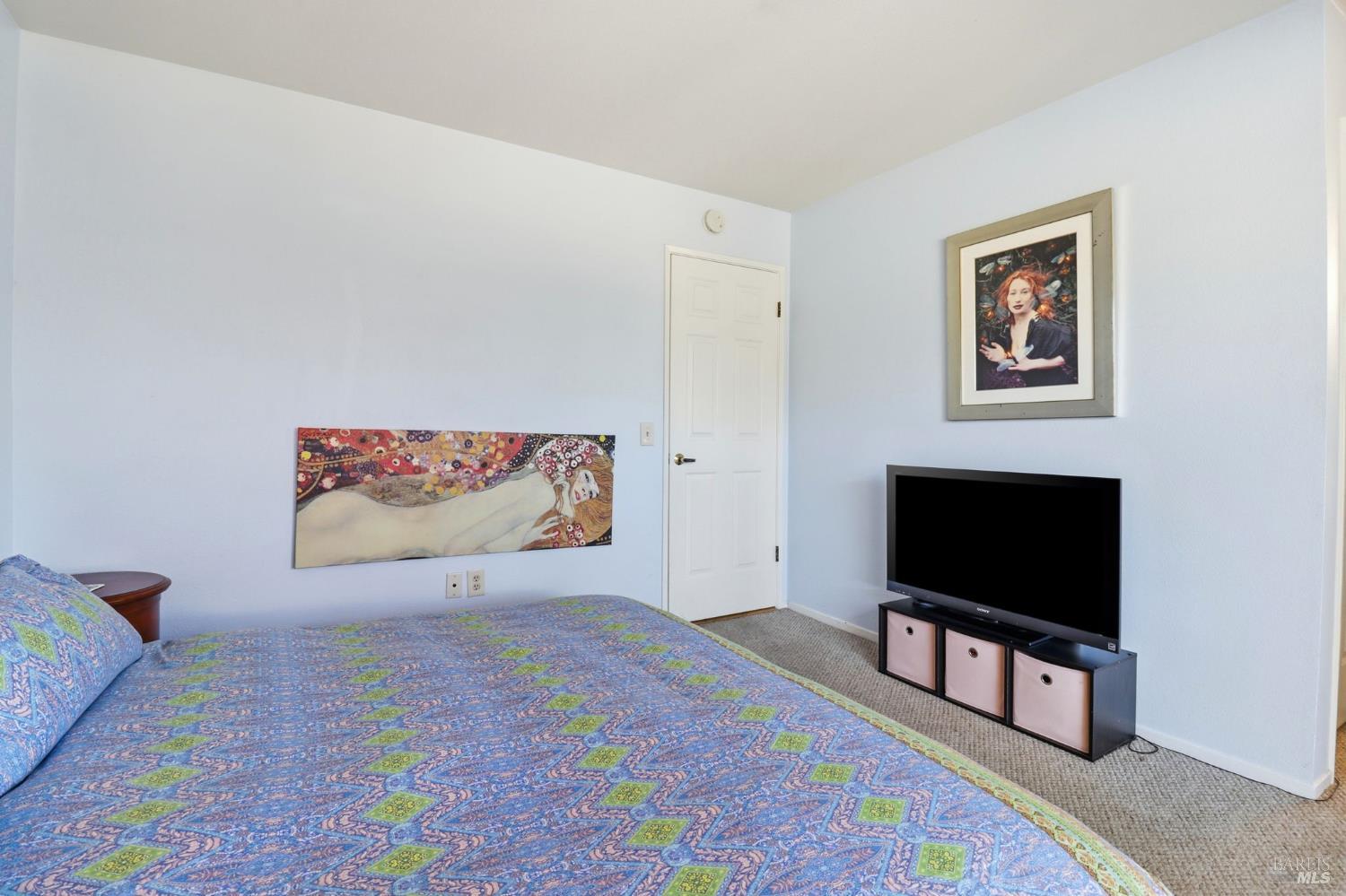 240 Seagull Row Novato, CA 94945 - Photo 19 of 33 a living room with furniture and a flat screen tv