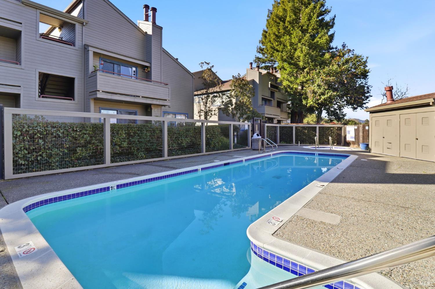 240 Seagull Row Novato, CA 94945 - Photo 27 of 33 a view of a building with a backyard