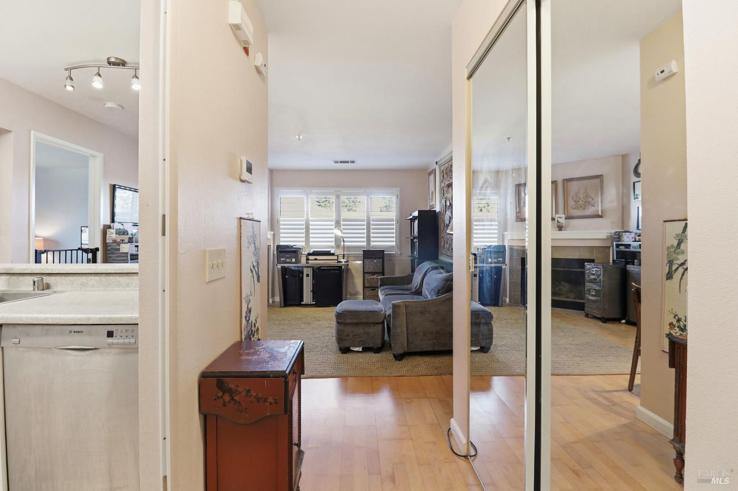 240 Seagull Row Novato, CA 94945 - Photo 31 of 33 a view of kitchen with refrigerator and wooden floor