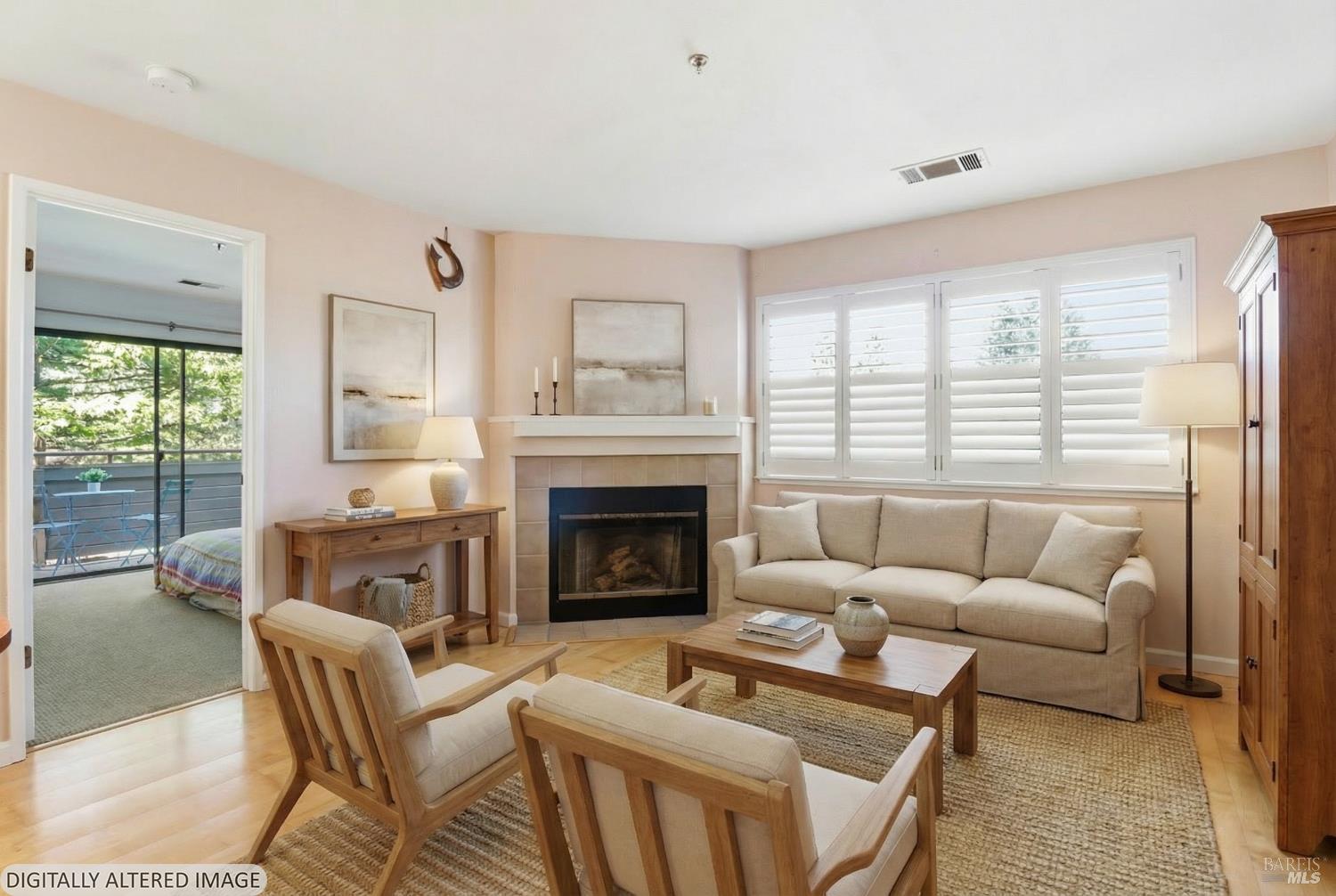 240 Seagull Row Novato, CA 94945 - Photo 5 of 33 a living room with furniture a large window and a fireplace