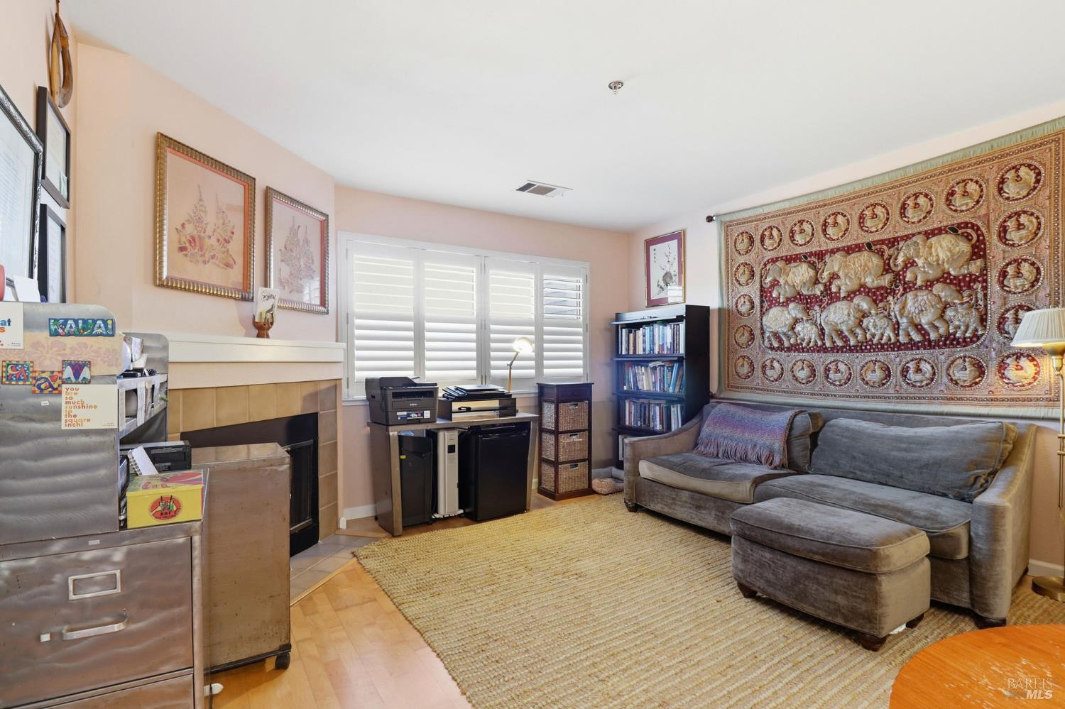 240 Seagull Row Novato, CA 94945 - Photo 8 of 33 a living room with fireplace furniture and flat screen tv