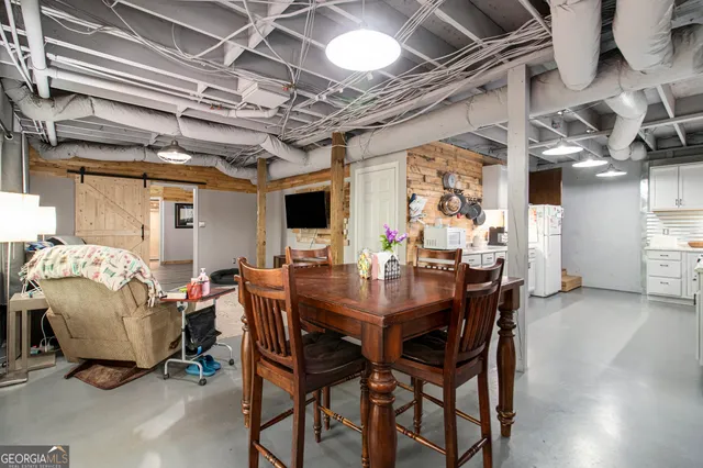 a kitchen with sink cabinets and window