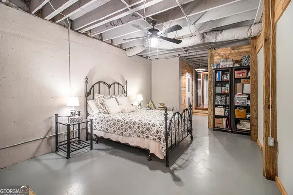 a view of a deck with furniture and garden