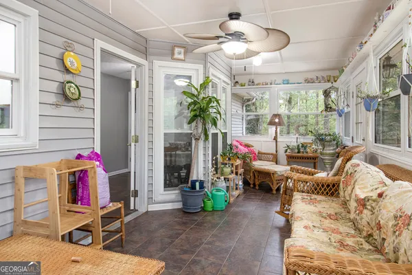 a living room filled with furniture