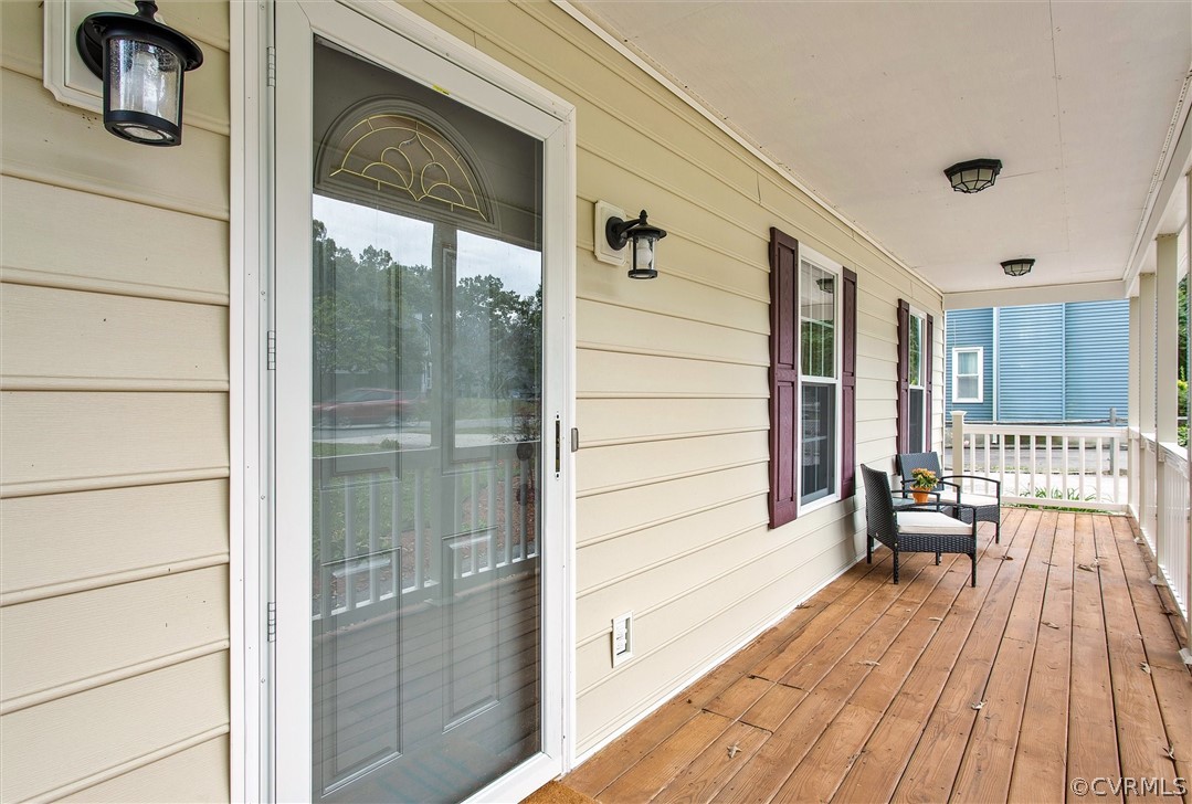 5025 Gention Road Chesterfield, VA 23832 - Photo 4 of 31 Porch has fresh stain and vinyls rails.