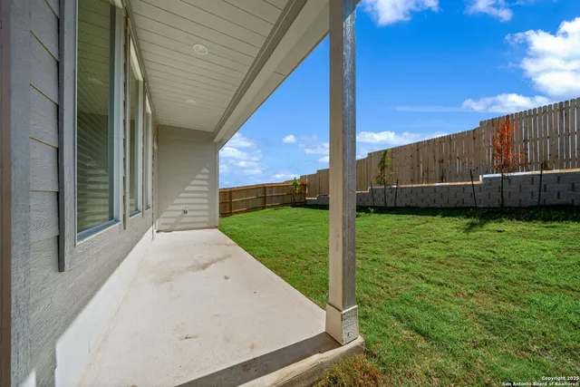 a view of a backyard with a garden