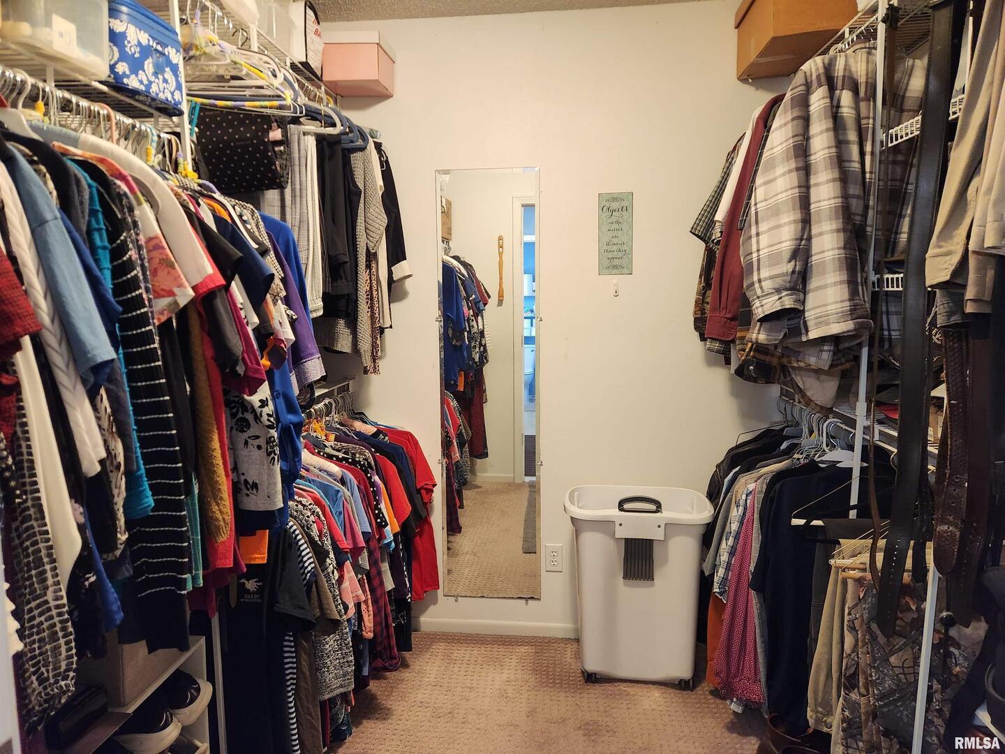 15766 East Tilton Road Ina, IL 62846 - Photo 13 of 59 a view of walk in closet with clothes