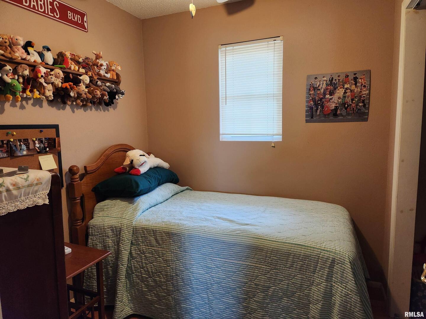 15766 East Tilton Road Ina, IL 62846 - Photo 30 of 59 a bedroom with a bed and a window