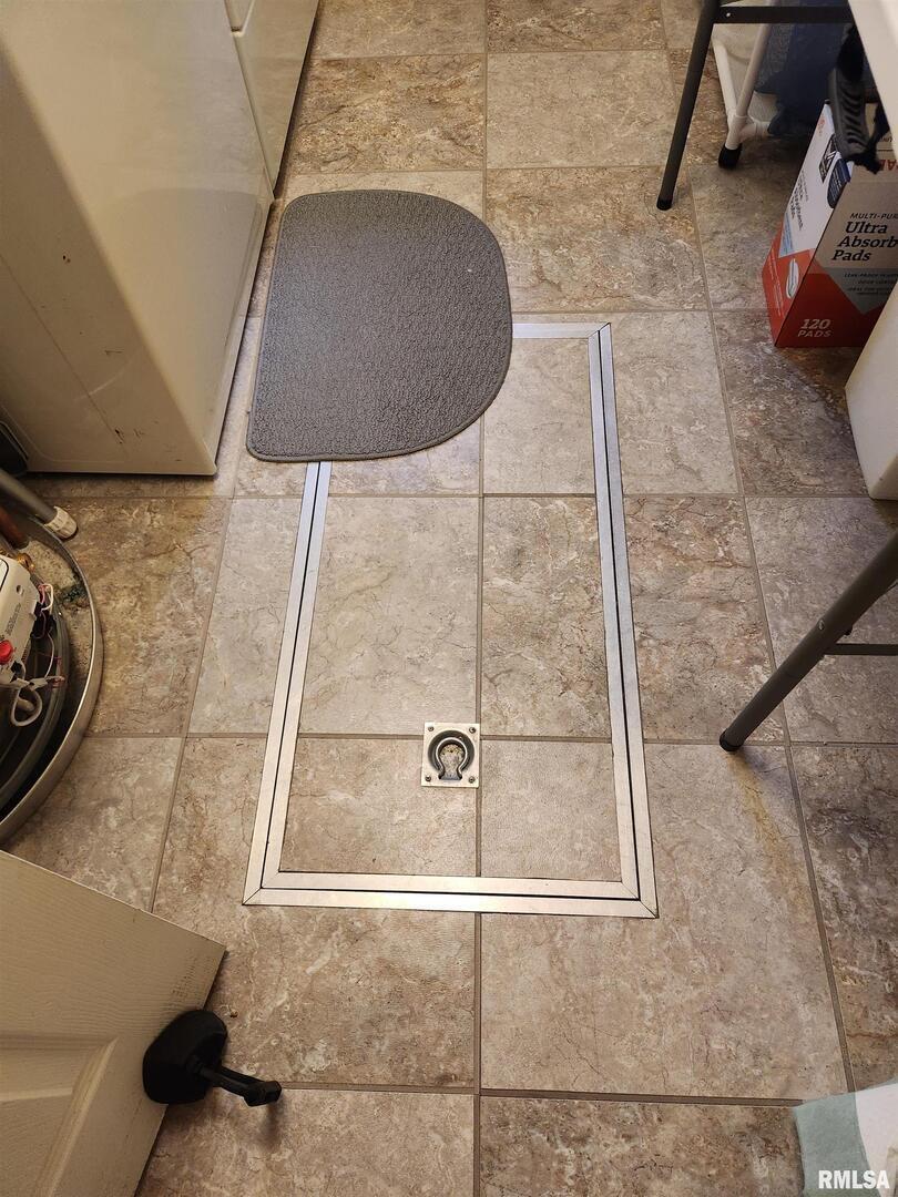 15766 East Tilton Road Ina, IL 62846 - Photo 36 of 59 a bathroom with a sink and a mirror