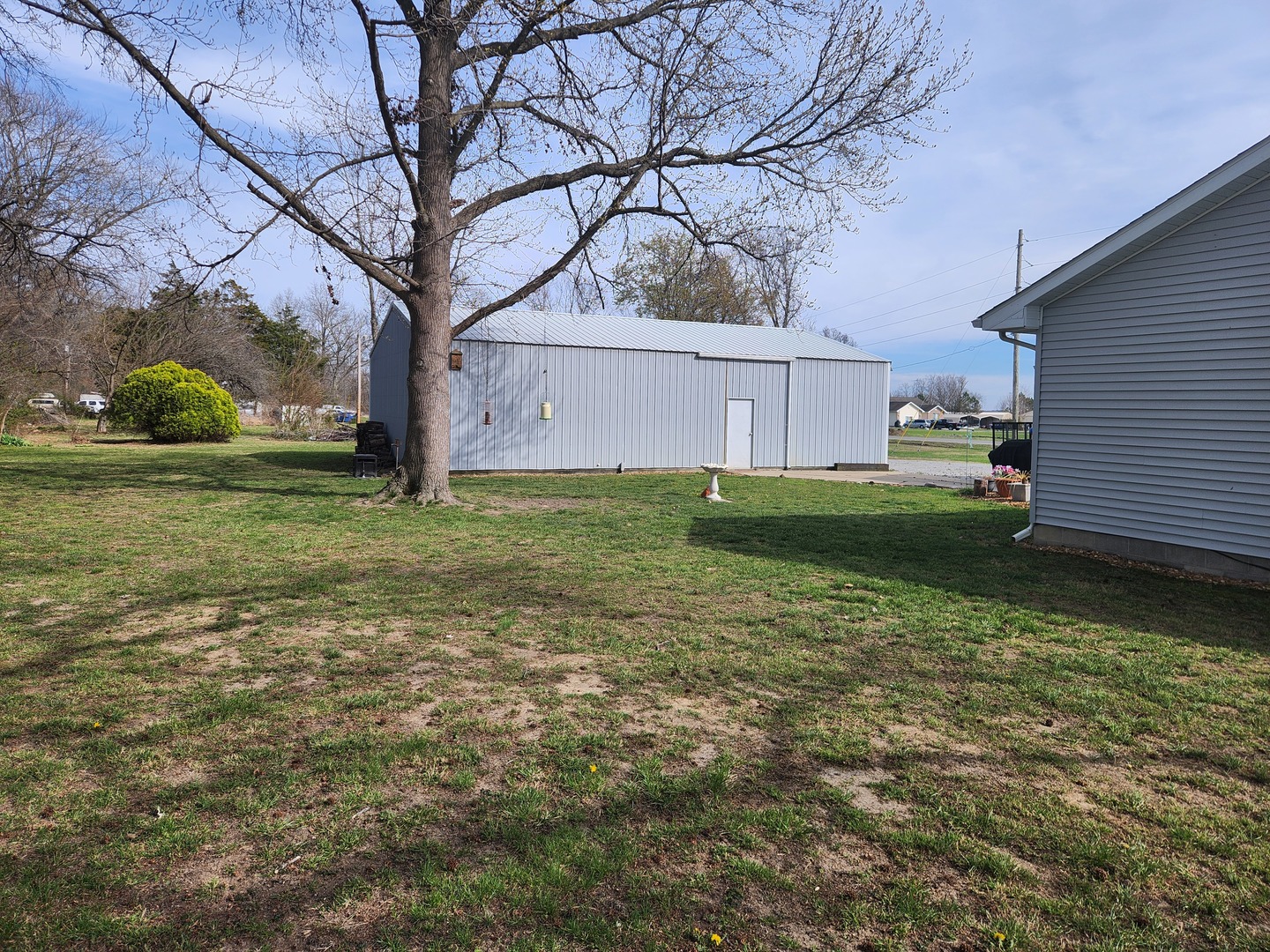 15766 East Tilton Road Ina, IL 62846 - Photo 53 of 59 a backyard of a house with lots of green space