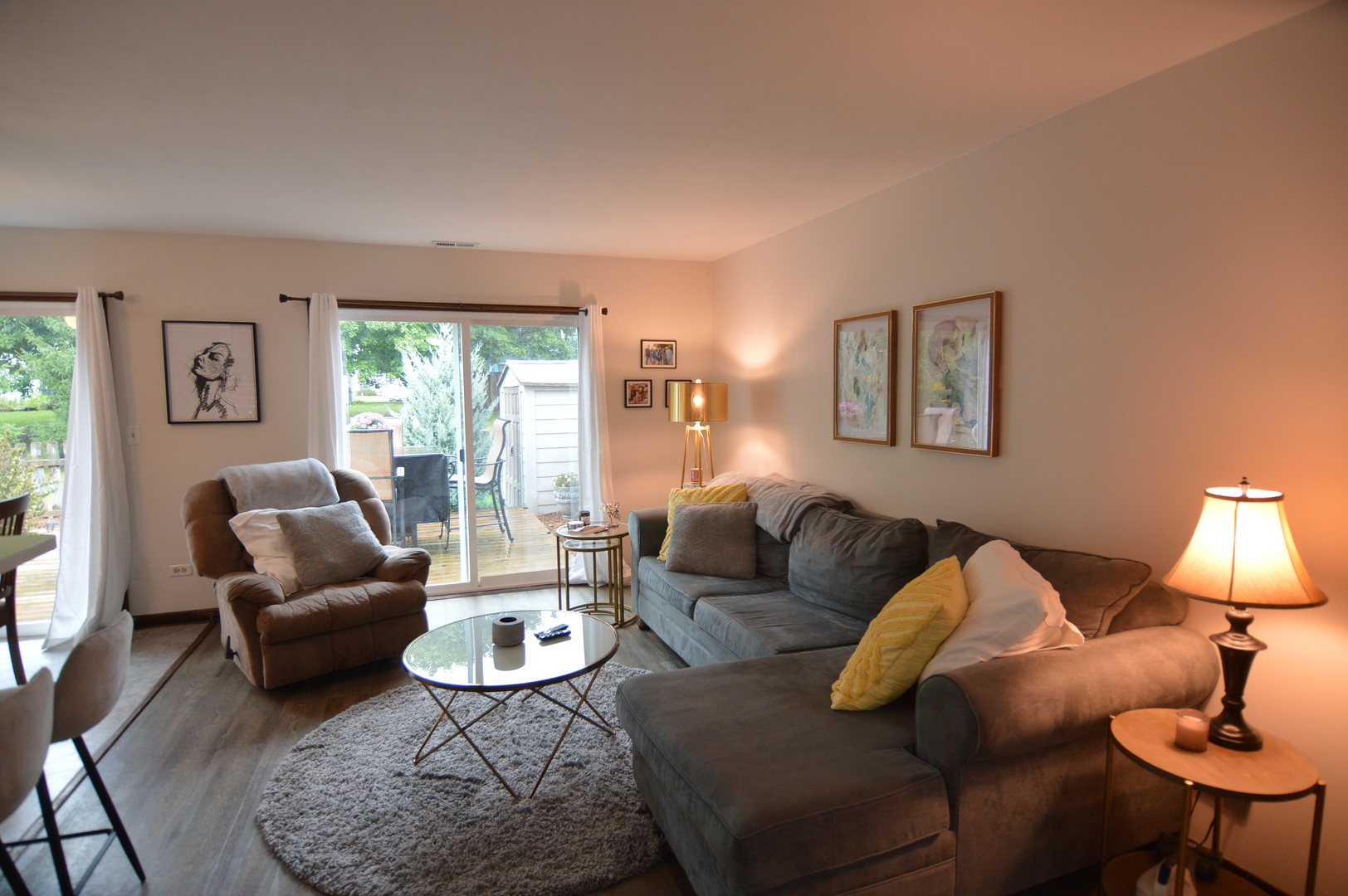 730 Nantucket Way Island Lake, IL 60042 - Photo 11 of 29 a living room with furniture a lamp a rug and a window