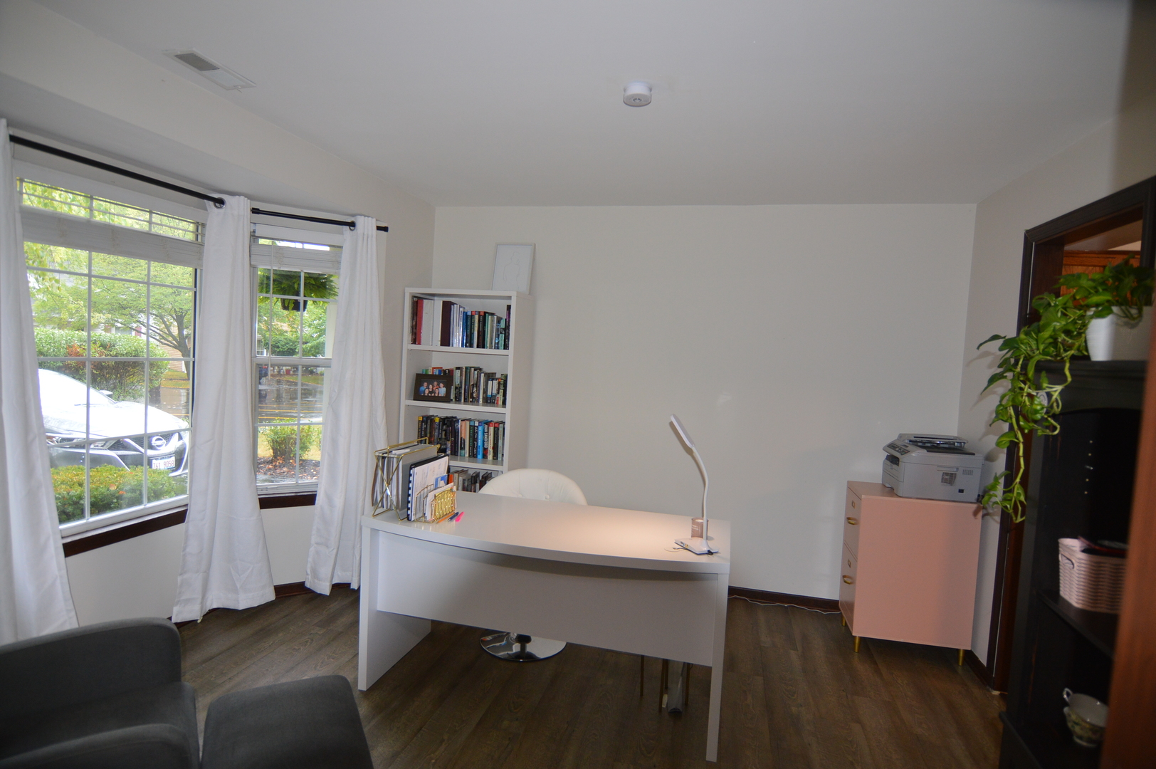 730 Nantucket Way Island Lake, IL 60042 - Photo 18 of 29 a workspace with furniture window and wooden floor