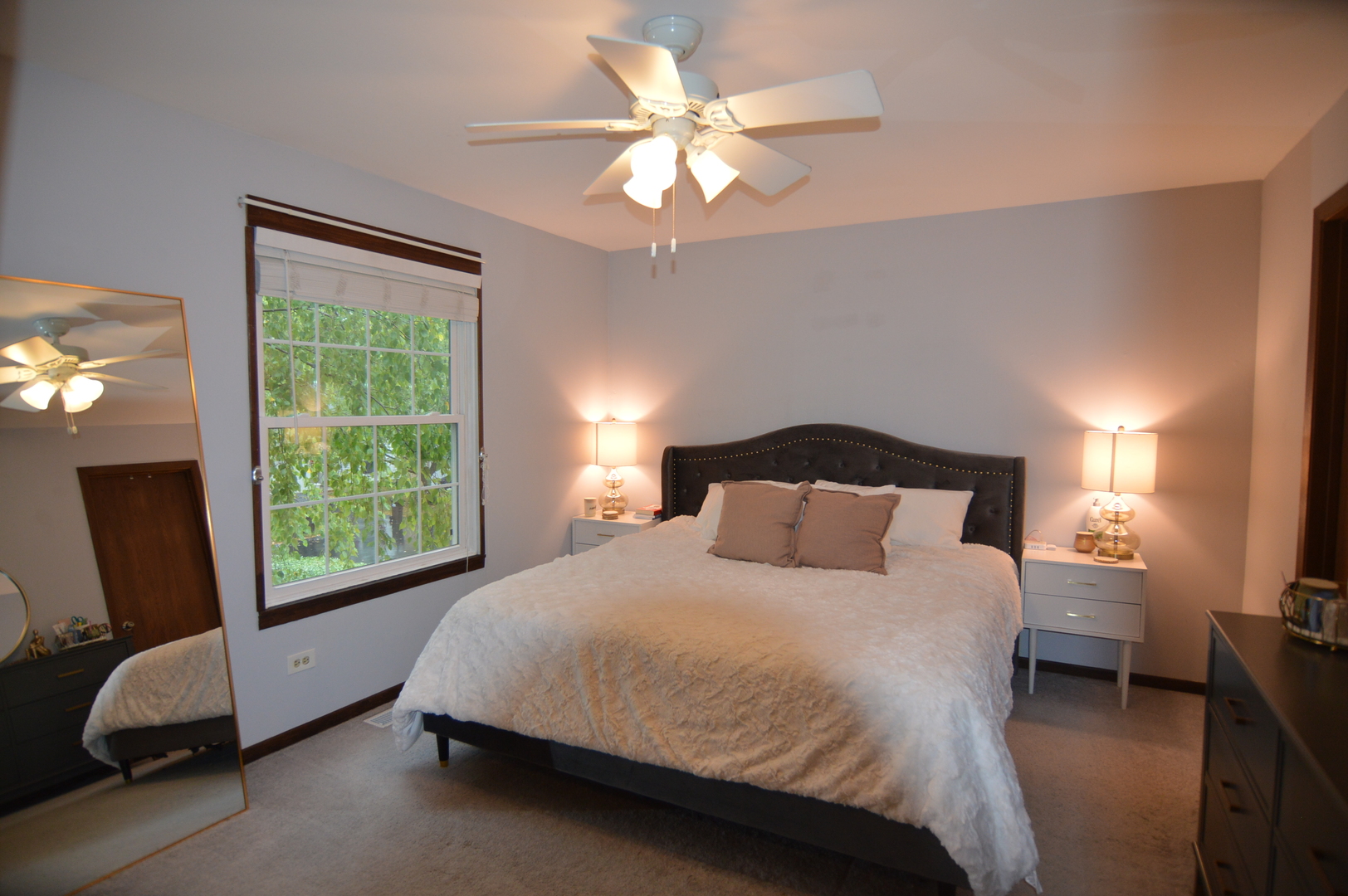 730 Nantucket Way Island Lake, IL 60042 - Photo 19 of 29 a bedroom with a bed and a large window