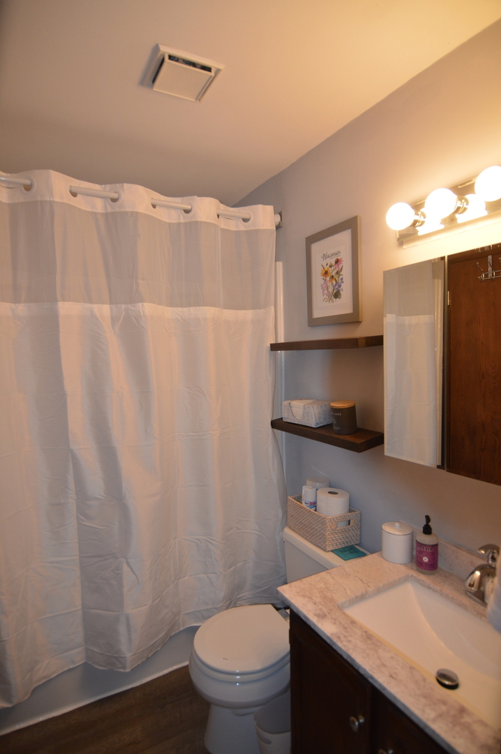 730 Nantucket Way Island Lake, IL 60042 - Photo 23 of 29 a bathroom with a sink toilet and mirror