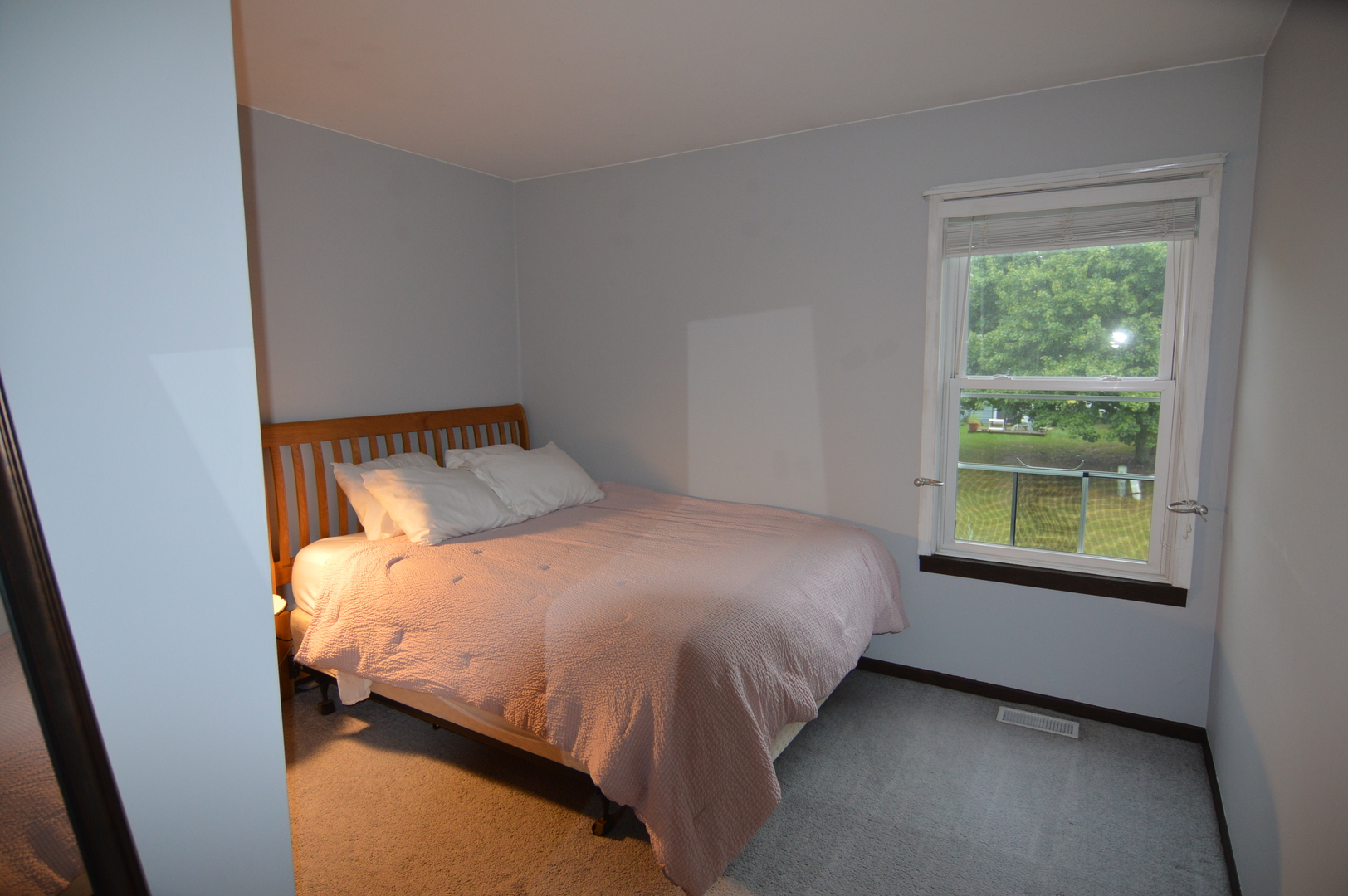 730 Nantucket Way Island Lake, IL 60042 - Photo 26 of 29 a bedroom with a bed and window