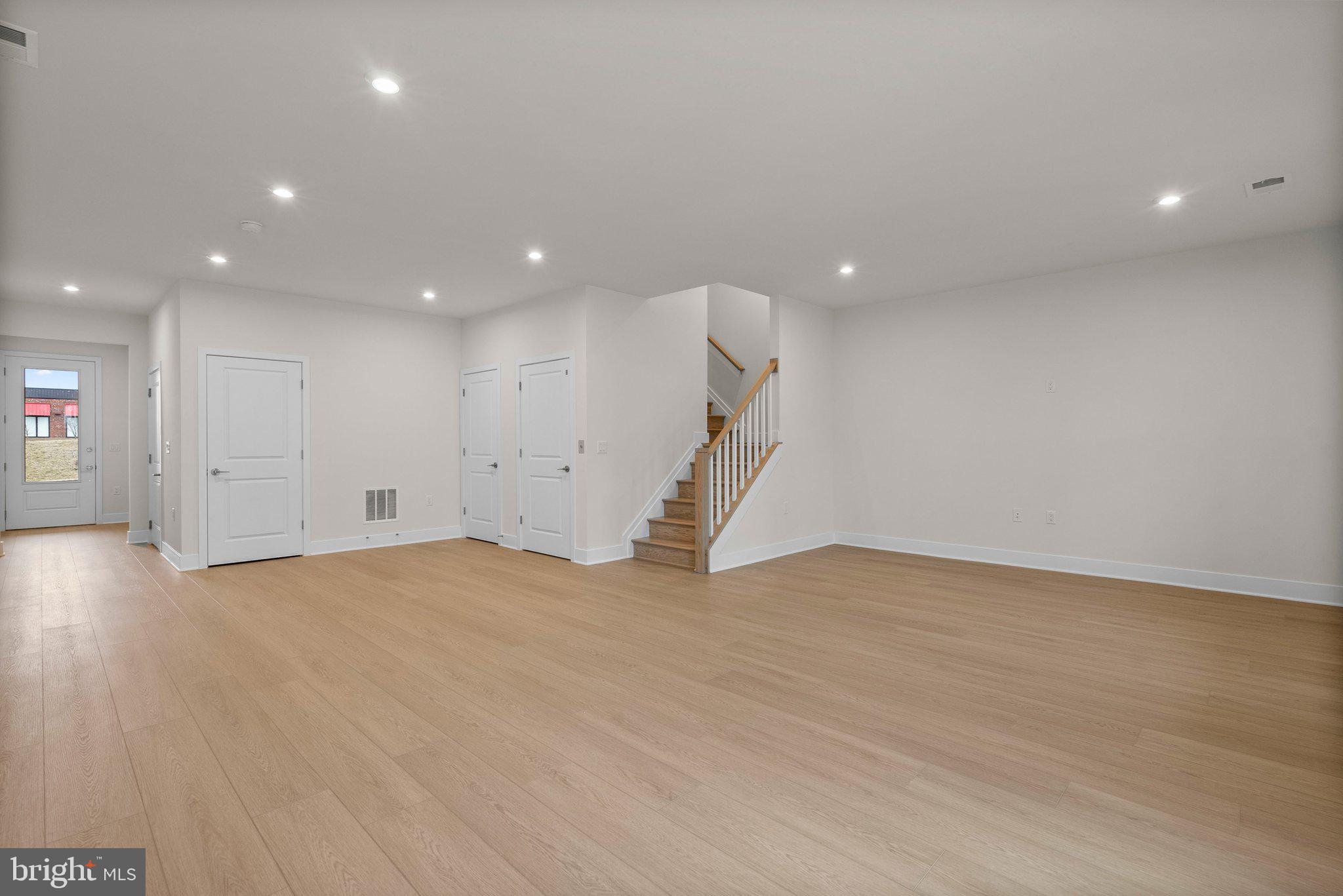 44480 Lowestoft Square Ashburn, VA 20147 - Photo 29 of 44 a view of an empty room with wooden floor