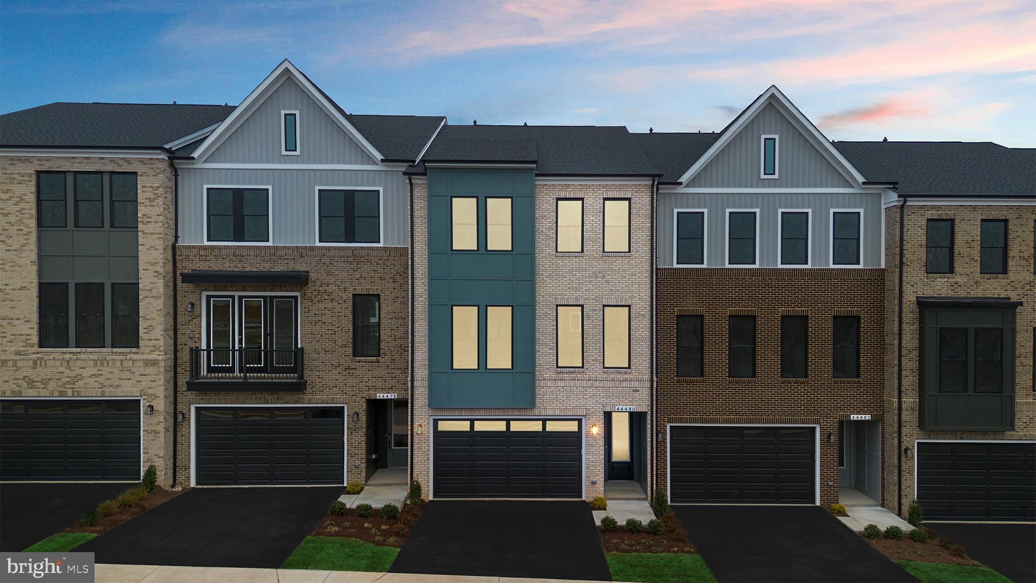 44480 Lowestoft Square Ashburn, VA 20147 - Photo 3 of 44 a front view of a house with a yard