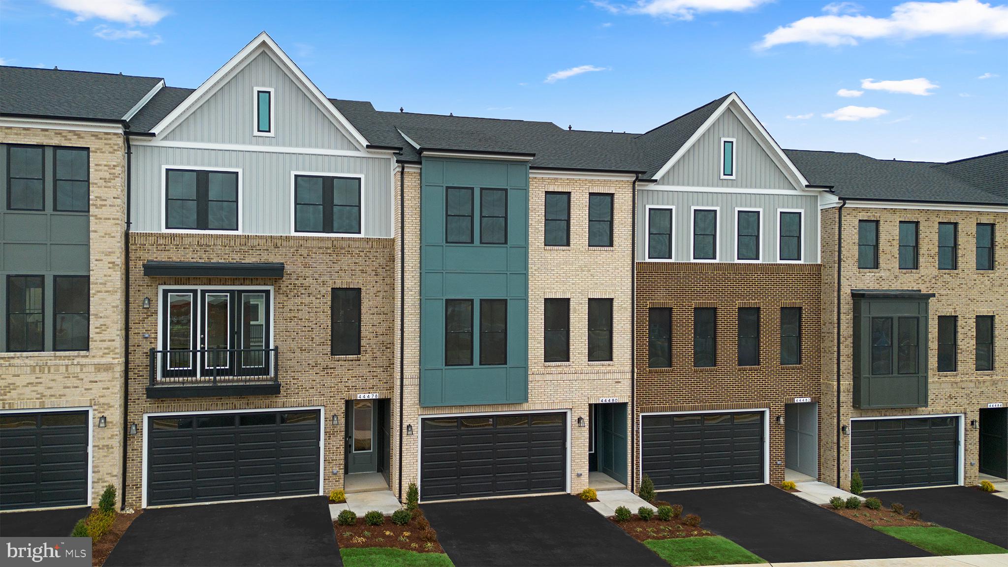 44480 Lowestoft Square Ashburn, VA 20147 - Photo 4 of 44 a front view of a house with a garage