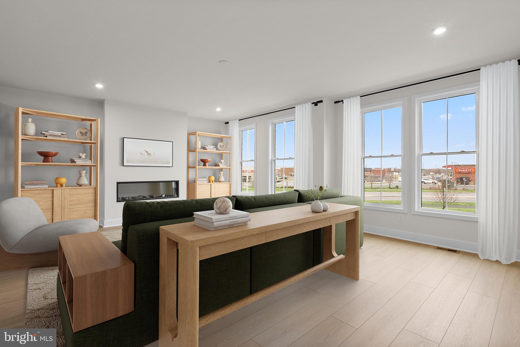 44480 Lowestoft Square Ashburn, VA 20147 - Photo 6 of 44 a living room with furniture and a large window