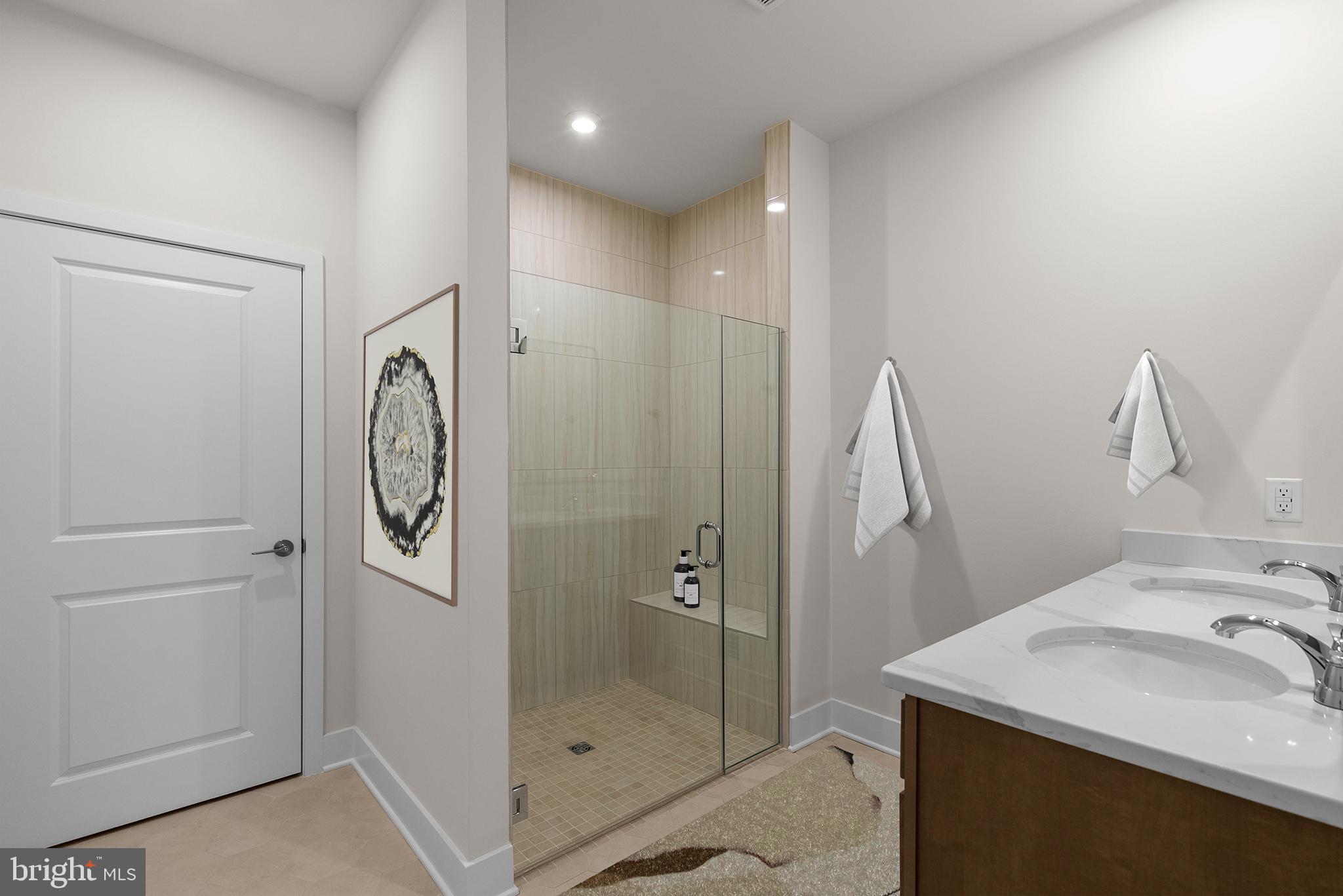 44480 Lowestoft Square Ashburn, VA 20147 - Photo 8 of 44 a bathroom with a sink and a mirror