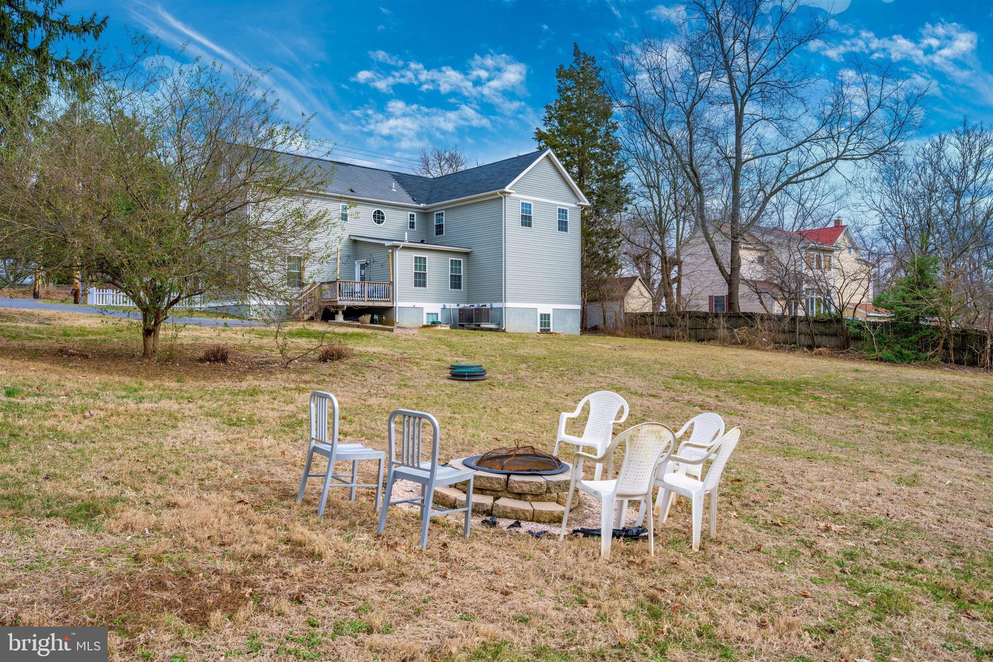 12529 Fingerboard Road Monrovia, MD 21770 - Photo 40 of 55 a view of a dinning table and chairs in the patio