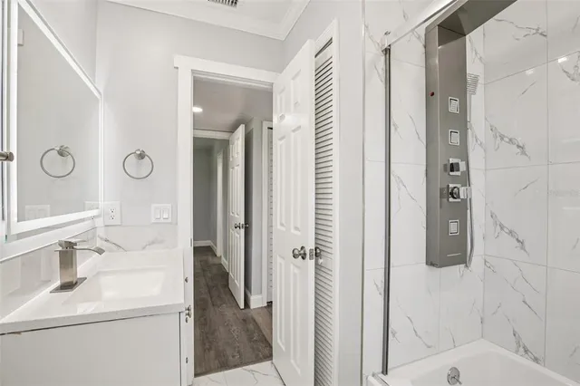 a view of an empty room with a window and balcony